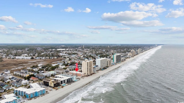 bird's eye view featuring a view of city, a water view, and a view of the beach