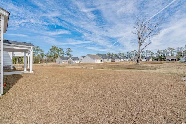 view of yard with a residential view