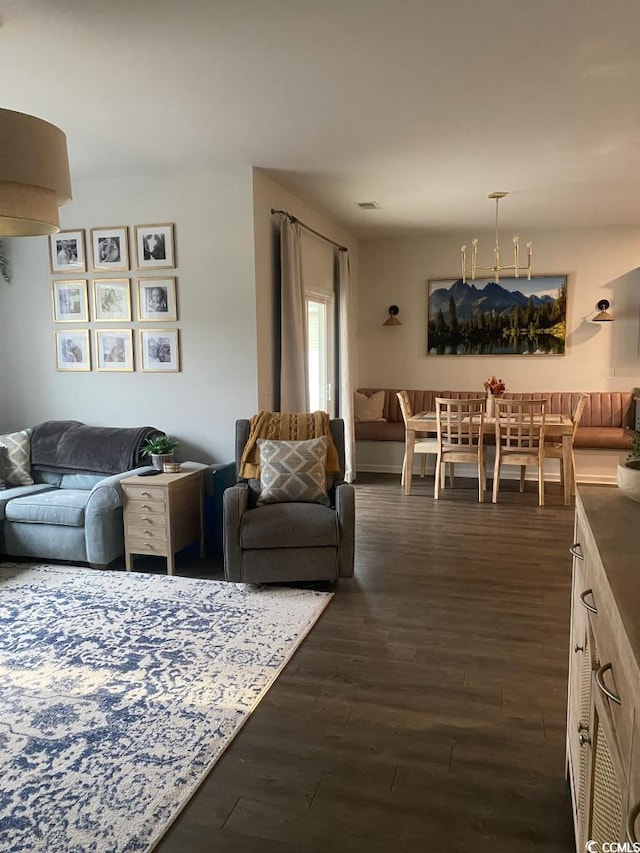 living area with dark wood-type flooring