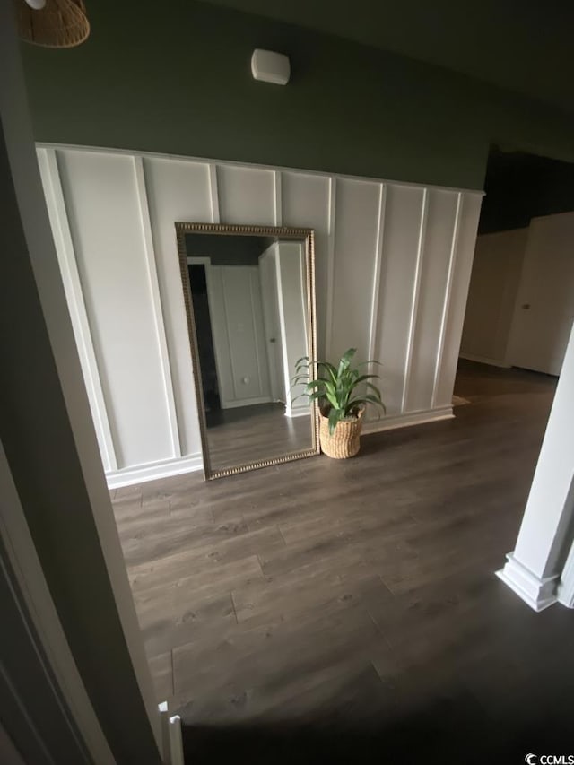 hallway with wood finished floors