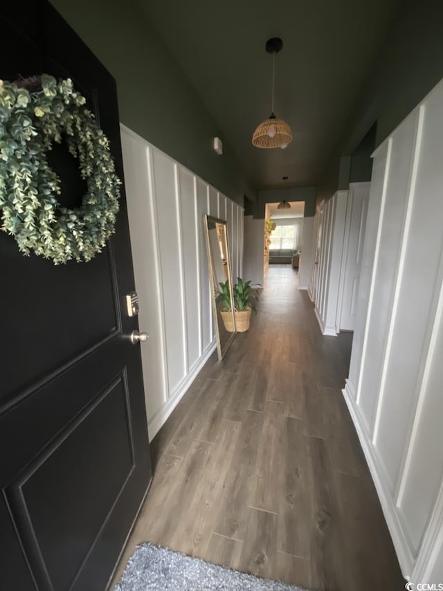 hallway featuring wood finished floors