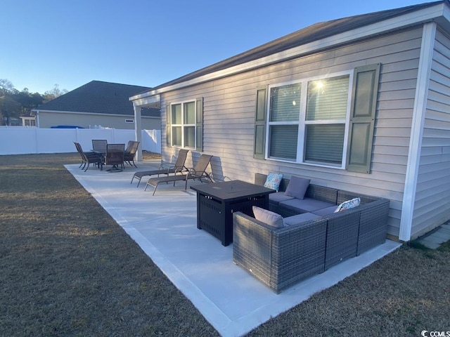 view of patio / terrace featuring fence and an outdoor living space