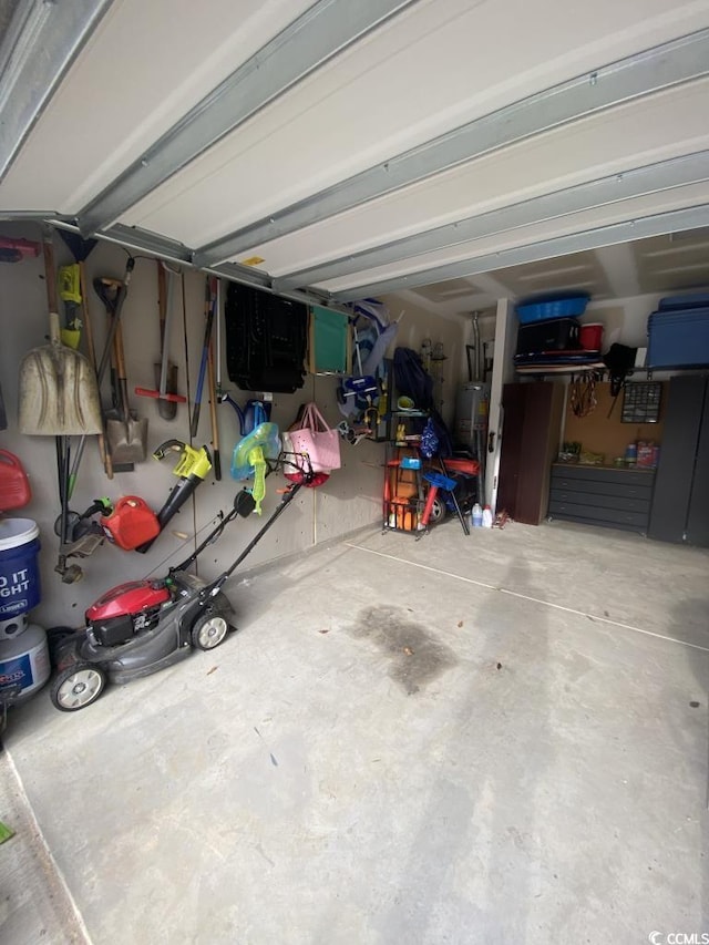 garage with strapped water heater