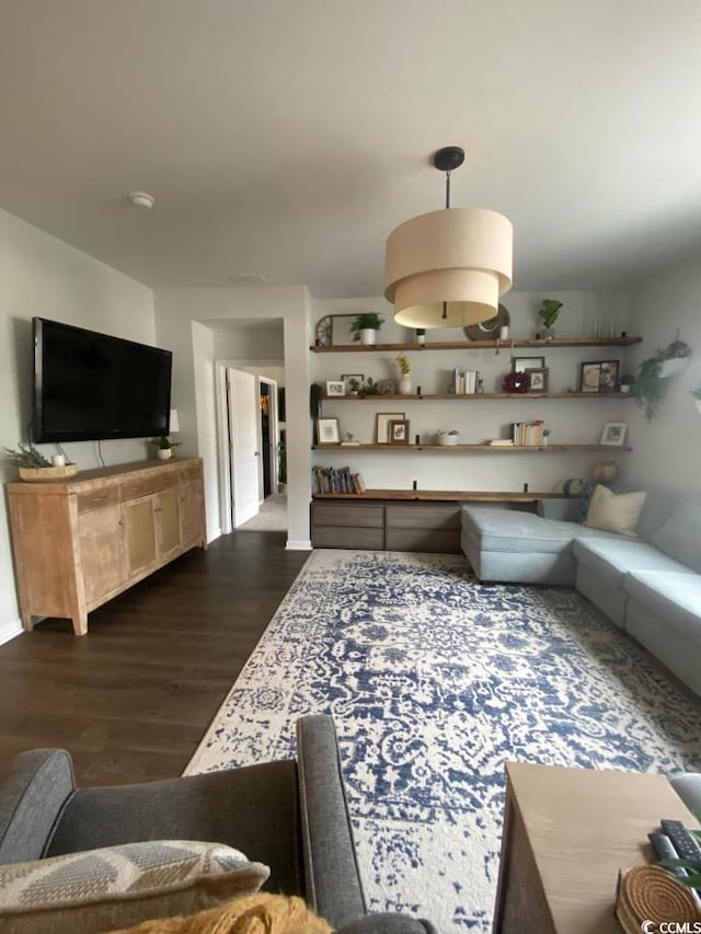 living room featuring dark wood-style flooring