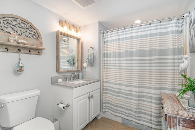 full bath featuring visible vents, a shower with shower curtain, toilet, tile patterned floors, and vanity