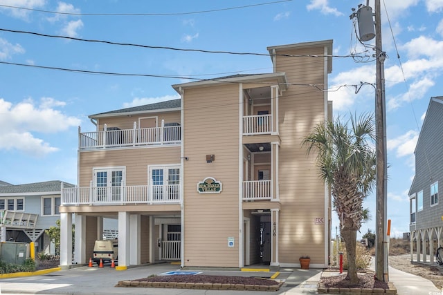 view of building exterior featuring a carport