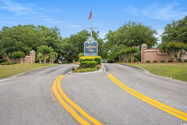 view of road with curbs