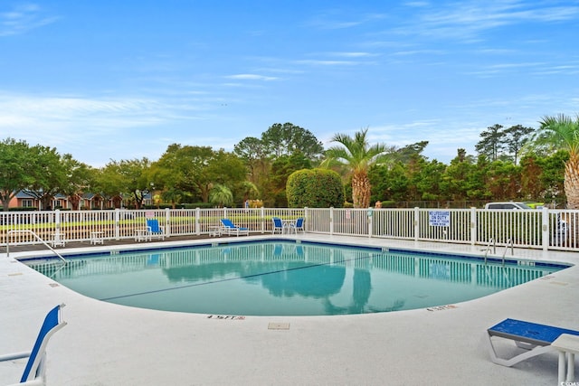 pool featuring fence