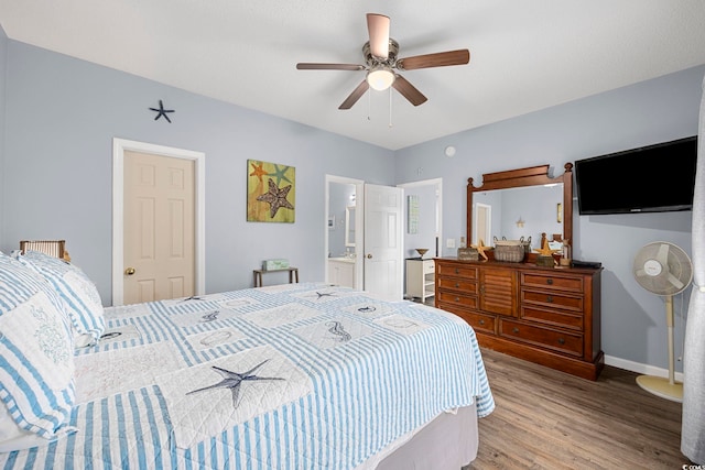 bedroom with light wood-type flooring, a ceiling fan, and baseboards