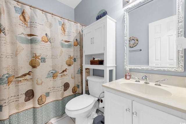 full bath featuring toilet and vanity