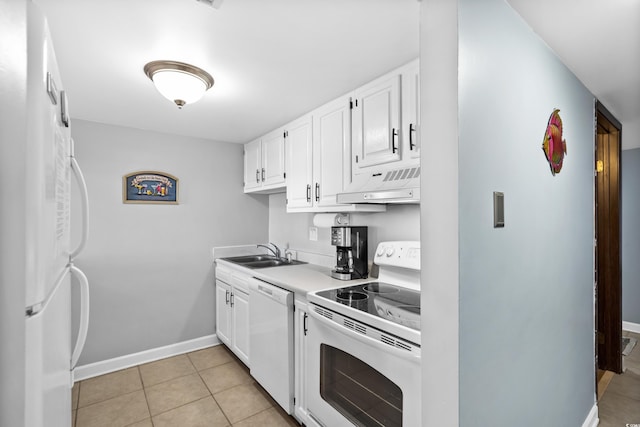 kitchen featuring light countertops, white cabinetry, a sink, white appliances, and under cabinet range hood