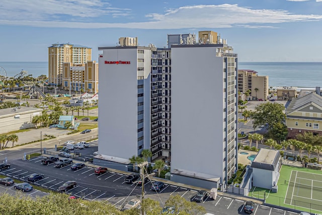 bird's eye view featuring a water view and a view of city