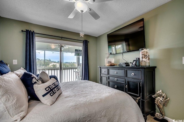 bedroom featuring a textured ceiling, access to outside, a ceiling fan, and baseboards