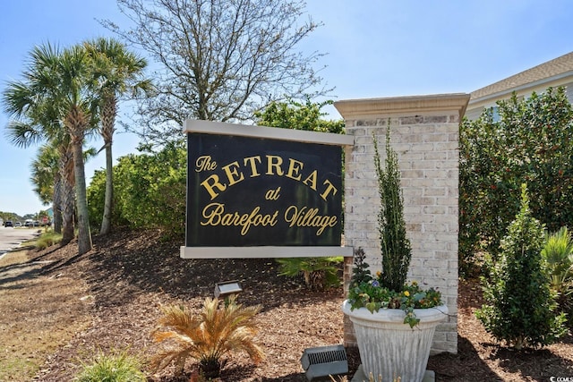 view of community sign