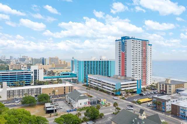 drone / aerial view with a water view and a view of city