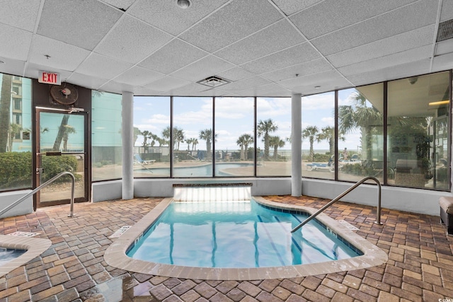 pool featuring an indoor hot tub