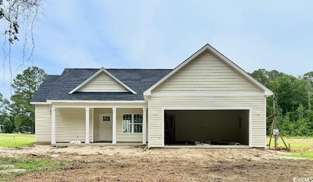 6049 Hodges Rd, Conway, SC 29527 - view of front of home featuring a shingled roof and an attached garage