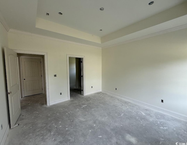 6049 Hodges Rd, Conway, SC 29527 - unfurnished bedroom featuring a raised ceiling, baseboards, ornamental molding, and a spacious closet