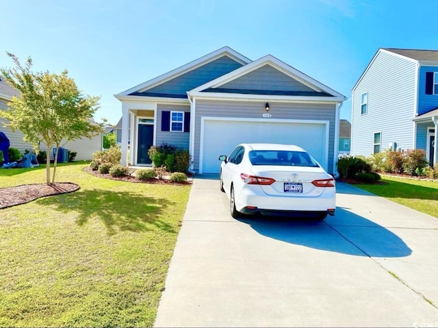 view of front of house featuring a garage, concrete driveway, and a front yard