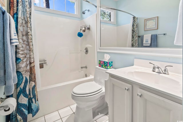 full bath featuring shower / tub combo with curtain, vanity, toilet, and tile patterned floors