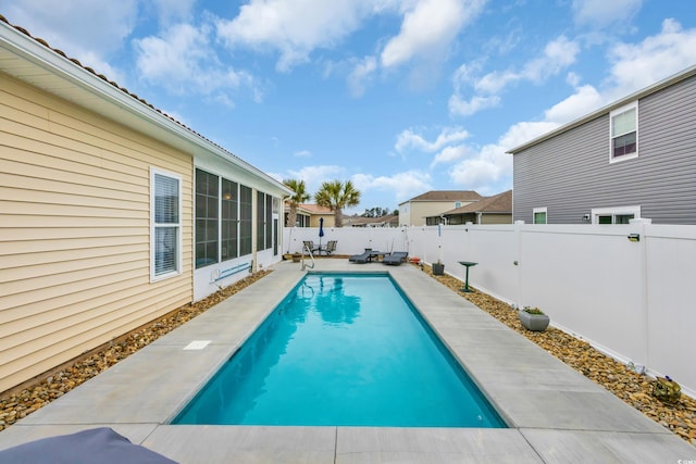 view of pool featuring a fenced in pool, a patio, and a fenced backyard