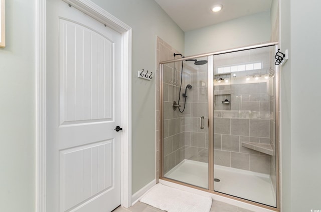 bathroom with a stall shower