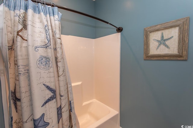 full bathroom featuring shower / tub combo