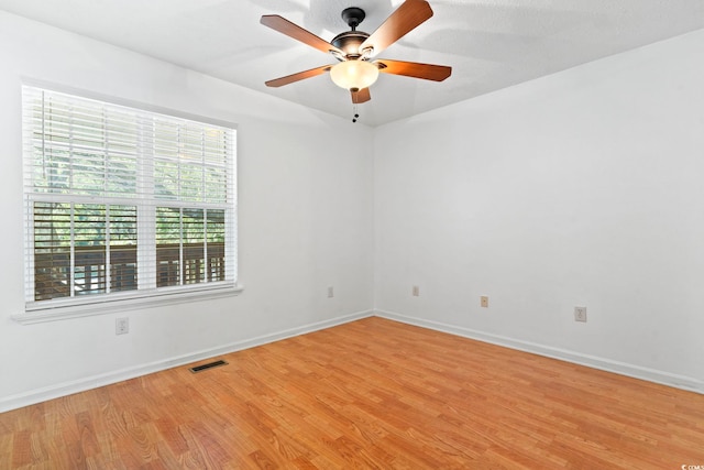 3615 Sunfish St, Murrells Inlet, SC 29576 - empty room featuring light wood-type flooring, visible vents, a ceiling fan, and baseboards
