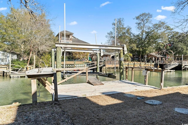 dock area featuring a water view