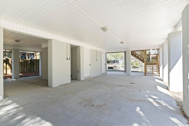 3615 Sunfish St, Murrells Inlet, SC 29576 - view of patio / terrace with stairway, a carport, and fence