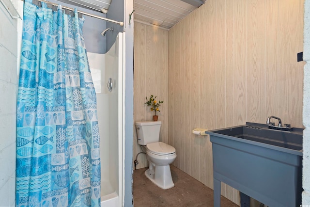 3615 Sunfish St, Murrells Inlet, SC 29576 - full bathroom featuring a sink, toilet, wood walls, concrete flooring, and a shower with shower curtain