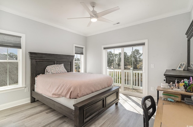 bedroom with light wood-style floors, access to outside, crown molding, and baseboards