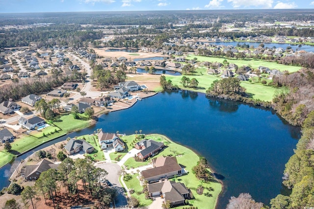 aerial view featuring a water view and a residential view