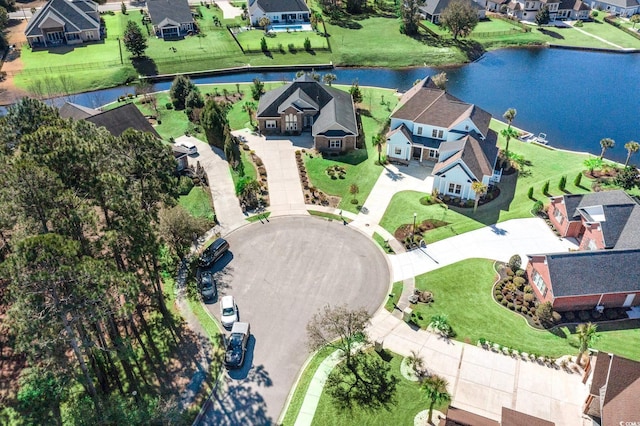 aerial view featuring a water view and a residential view