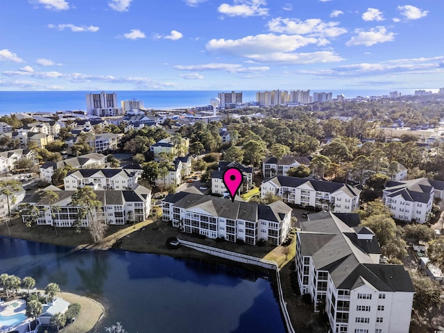 drone / aerial view with a water view and a view of city