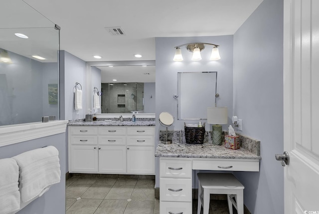 full bathroom featuring recessed lighting, visible vents, a stall shower, vanity, and tile patterned floors