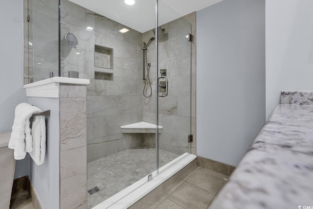 bathroom featuring a stall shower