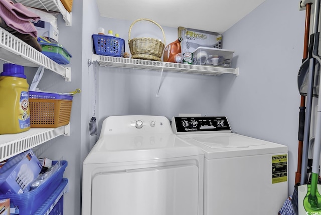 laundry room featuring laundry area and separate washer and dryer