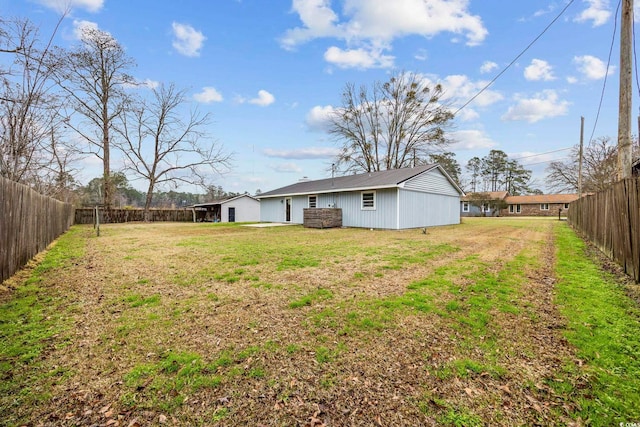 view of yard with a fenced backyard