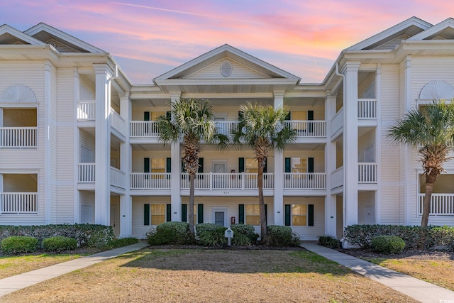 view of property at dusk