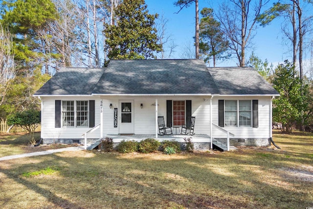 view of front of house featuring crawl space, a front lawn, a porch, and roof with shingles