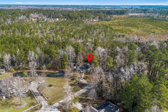 aerial view with a wooded view