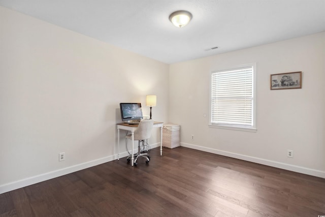 office with wood finished floors, visible vents, and baseboards