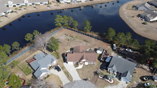 aerial view featuring a water view and a residential view