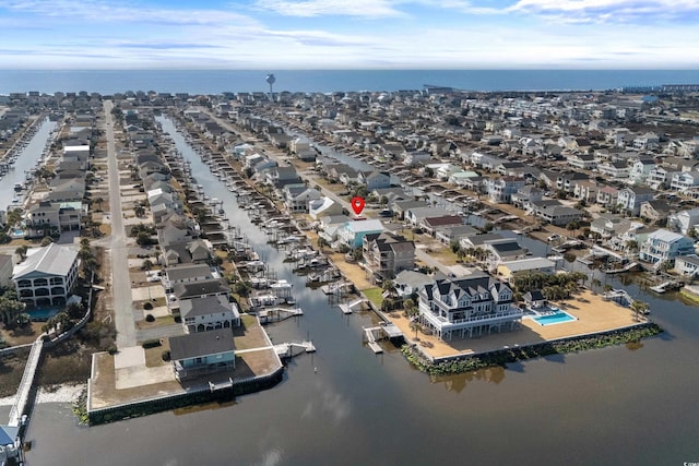 aerial view featuring a residential view and a water view