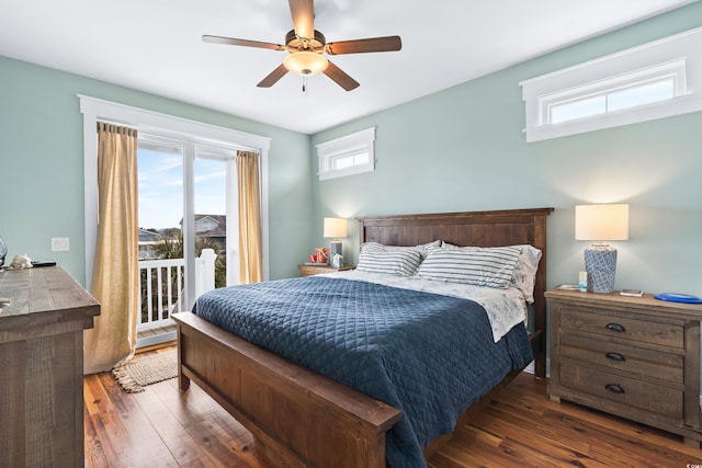 bedroom with access to exterior, ceiling fan, and dark wood-type flooring