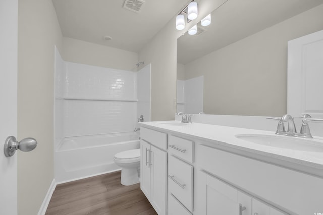 1064 Jase Dr, Longs, SC 29568 - full bath with wood finished floors, toilet, double vanity, and shower / bathtub combination
