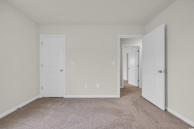 1064 Jase Dr, Longs, SC 29568 - unfurnished bedroom with light carpet and baseboards
