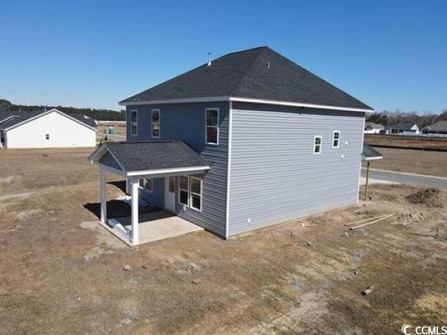 back of house featuring a patio area