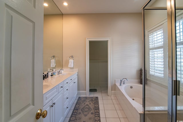 bathroom featuring double vanity, recessed lighting, a sink, tile patterned flooring, and a bath